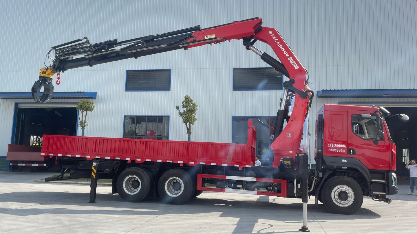 Crane truck with grapple